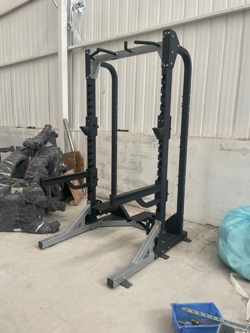Squat rack with pull up station