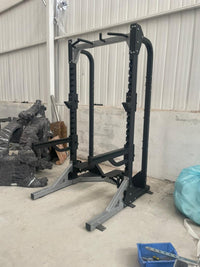 Squat rack with pull up station